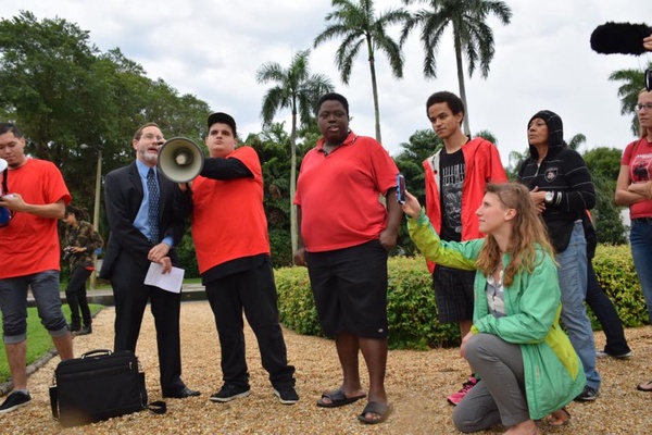 PLN speaks at GEO Group shareholder meeting protest in FL April 2015